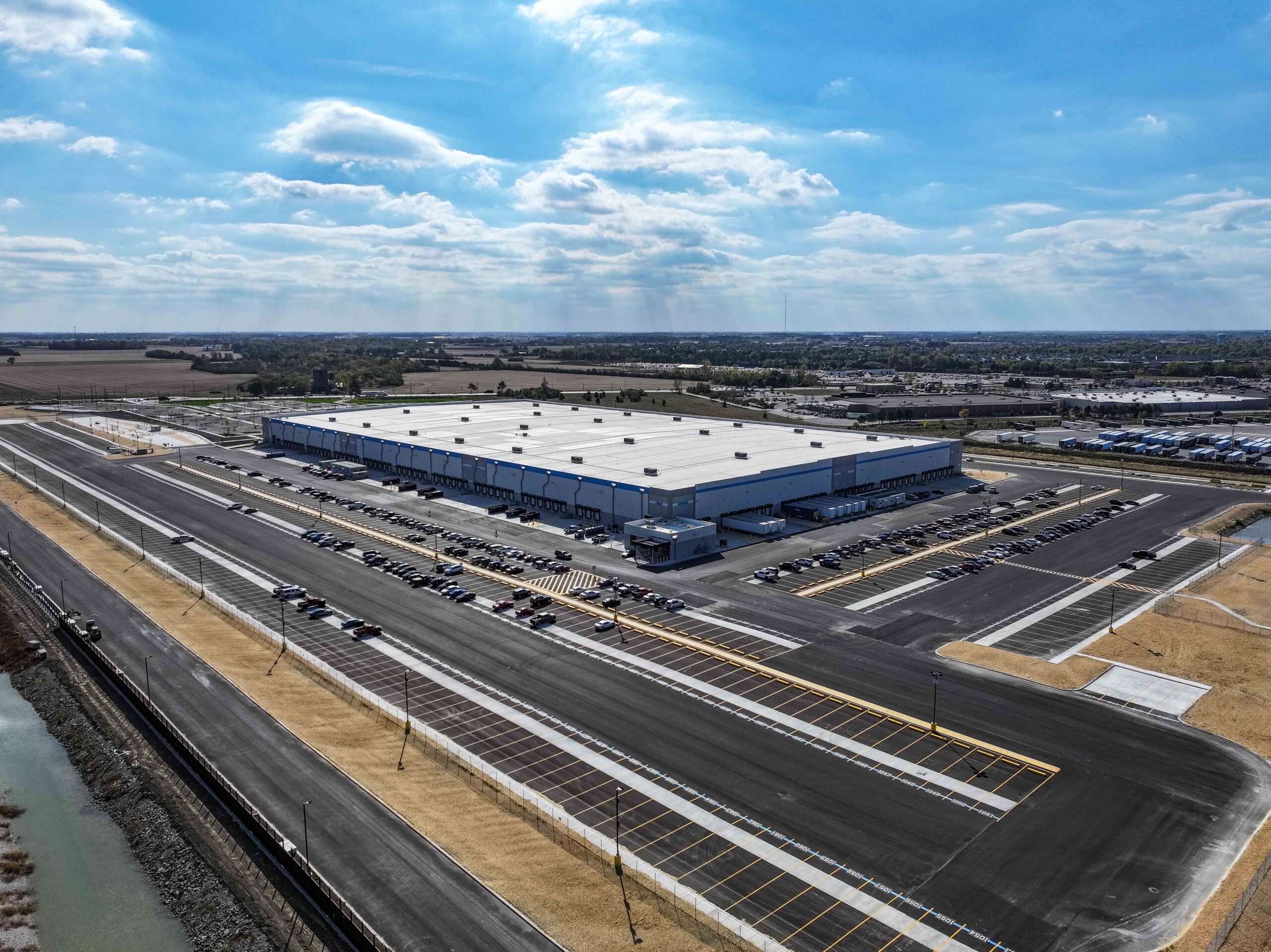 Drone Brothers, on behalf of Ryan Companies, captured aerial images to provide visual data for Project Yellow Jacket in Perrysburg, Ohio, 43551. The $50 million warehouse project is on its way to being finalized. A 600,000-square-foot warehouse is being proposed on 162 acres at 9240 Fremont Pike. The location is on the north side of Fremont Pike, between the shopping center with Target and Home Depot to the west on U.S. Rt. 20, and the township building to the east on Lime City Road, said Kelly Moore, township zoning administrator. Wade Gottschalk, executive director of the Wood County Economic Development Commission, said the project will bring 500 jobs to the area. From commercial real estate project conception to completion and beyond, Ryan Companies puts their hearts into creating spaces that bring your story to life.